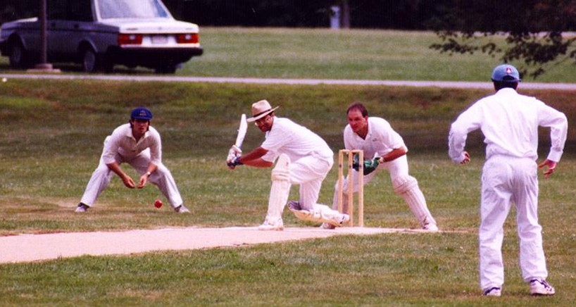 Vishal Misra (center) playing cricket.