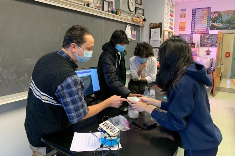 Jason Econome, in his classroom at Stuyvesant High School, overseeing the yeast lab activity he planned this past summer.