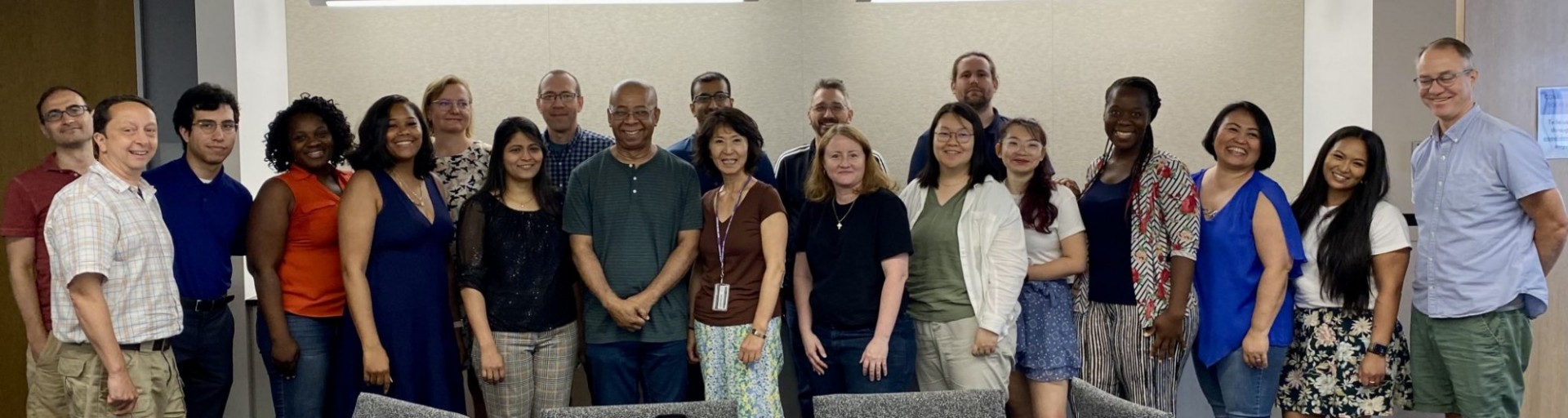 A group shot of all the teachers from the program posing together