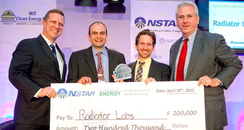Taken in 2012, John Kymissis (center left) with Marshall Cox (center right), after winning the grand prize in the MIT Clean Energy startup competition. Credit: John Kymissis Taken in 2012, John Kymissis (center left) with Marshall Cox (center right), after winning the grand prize in the MIT Clean Energy startup competition. Credit: John Kymissis