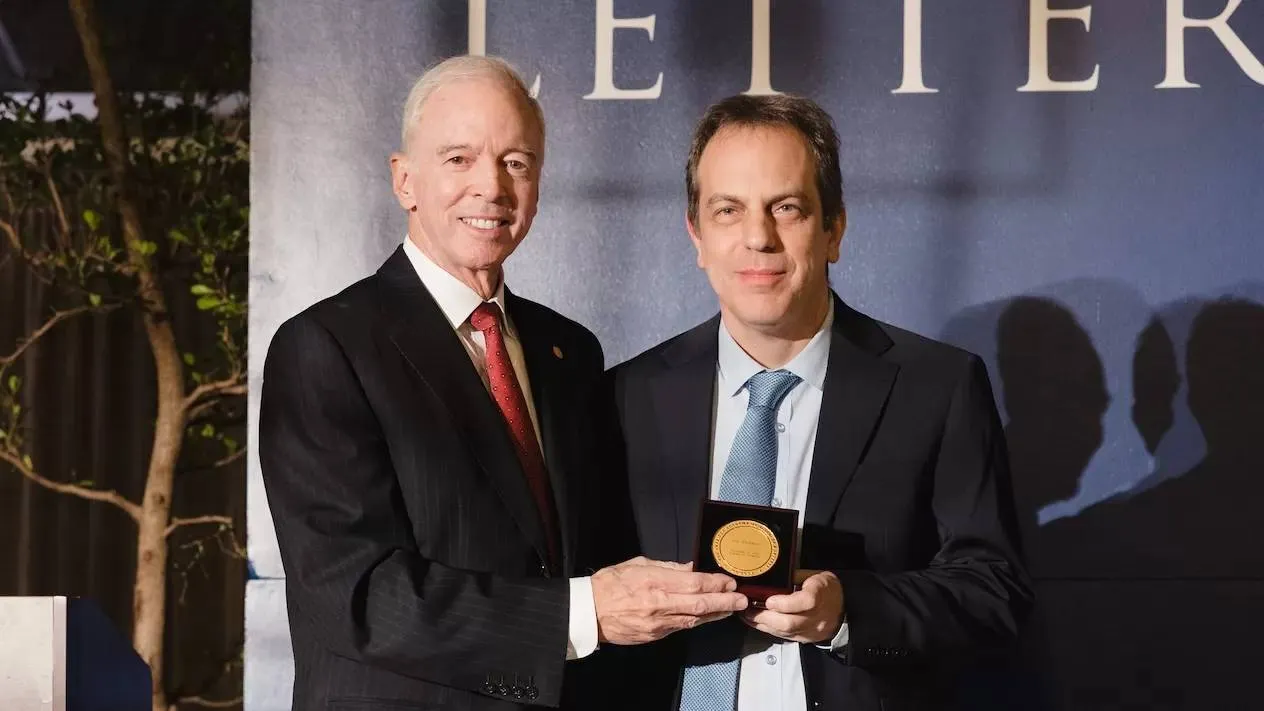 The networking expert was honored for his distinguished contribution to human learning.